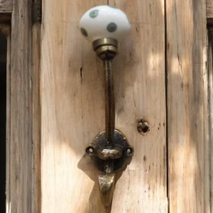 Green spotted ceramic knob coat hook