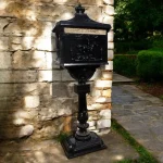 black pedestal metal mailbox