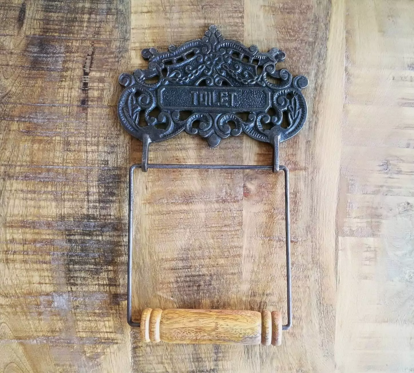 The Iron Toilet Roll Holder