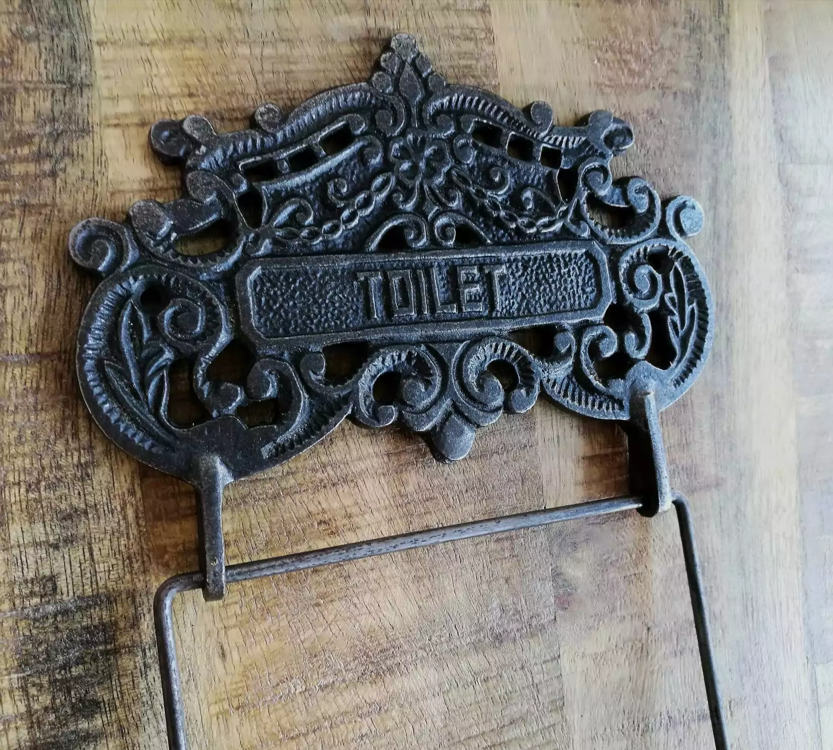 The Iron Toilet Roll Holder