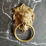 The Brass Lions Head Knocker