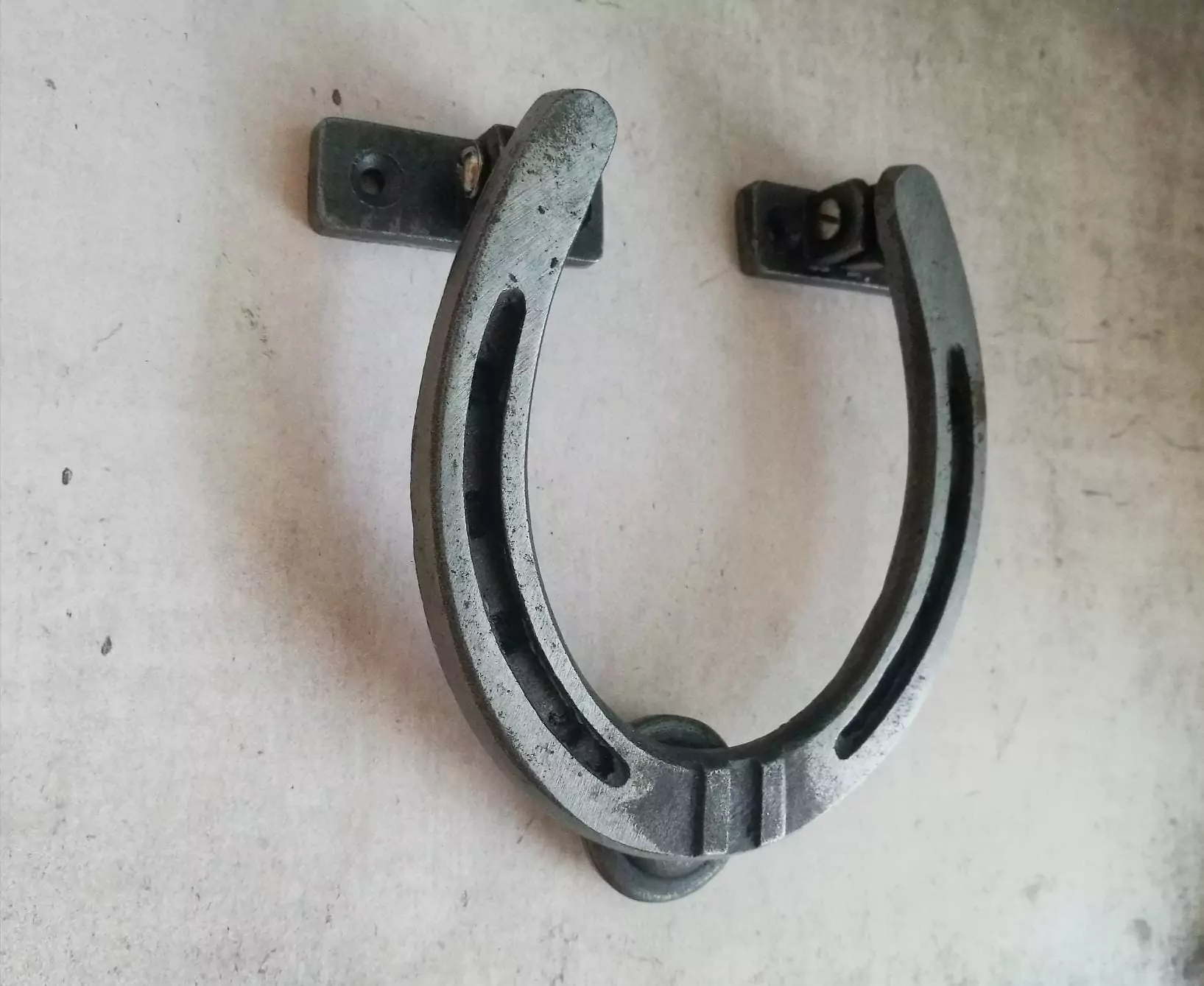 The Iron Horseshoe Knocker