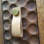 The Taupe Leather Brass Disc
