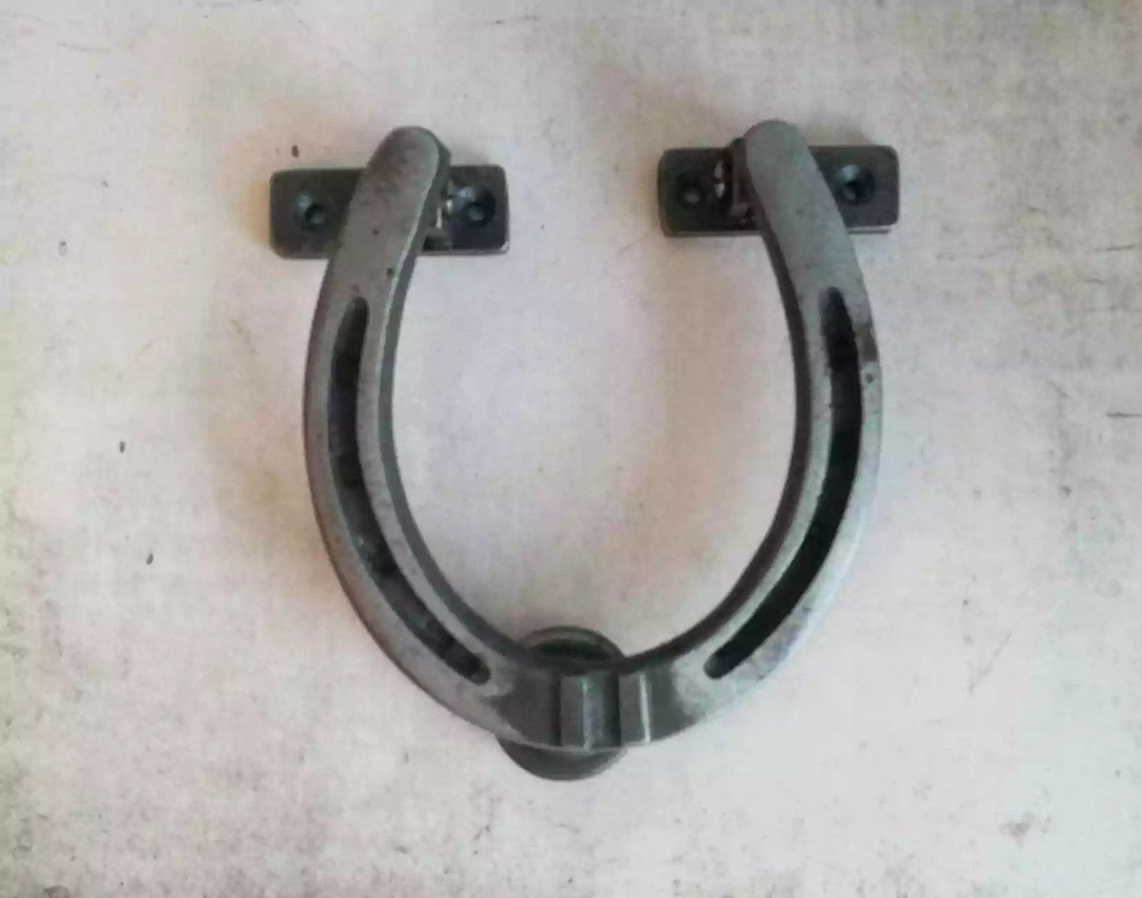 The Iron Horseshoe Knocker