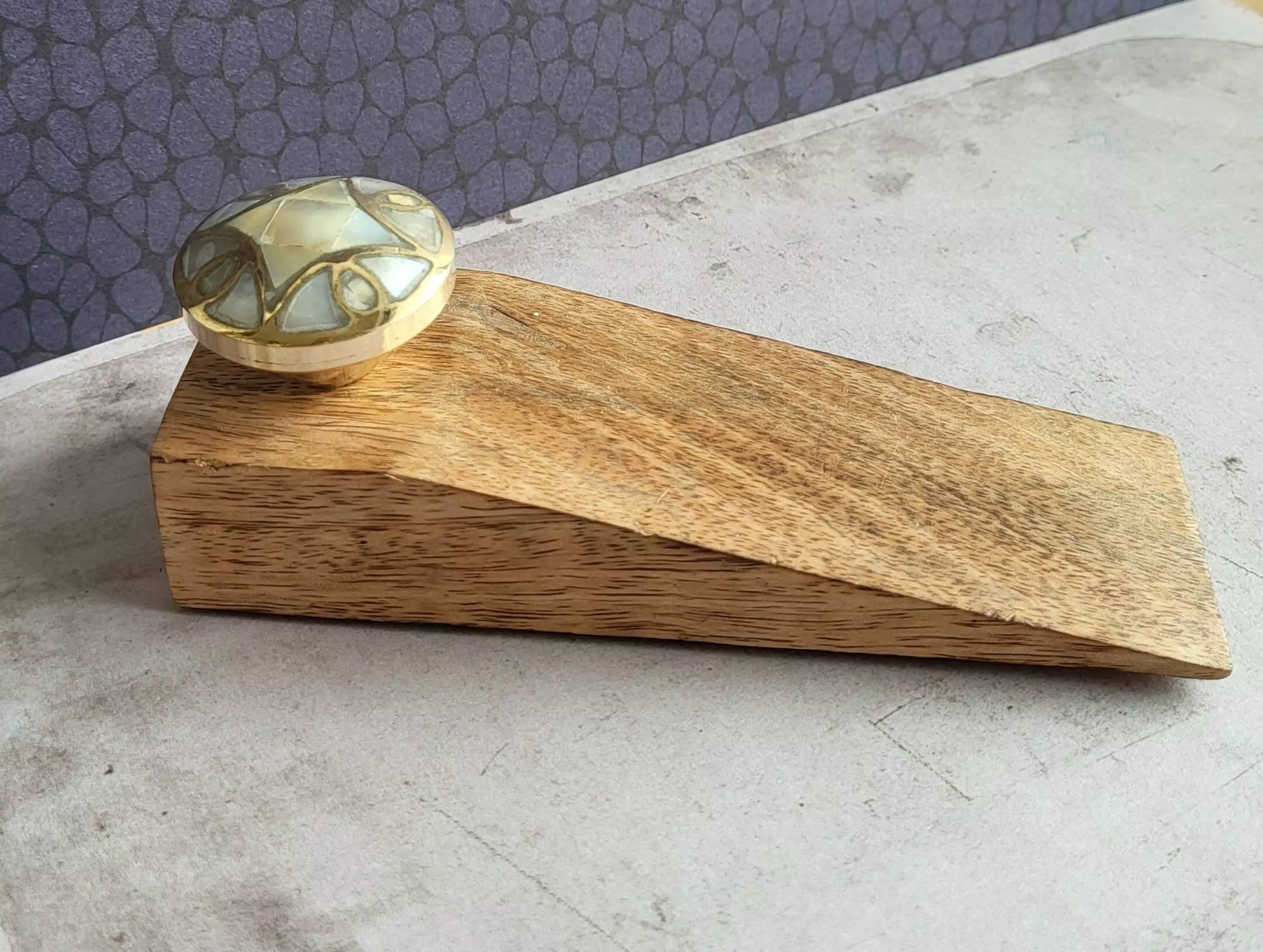 The Brass Divine Wedge
