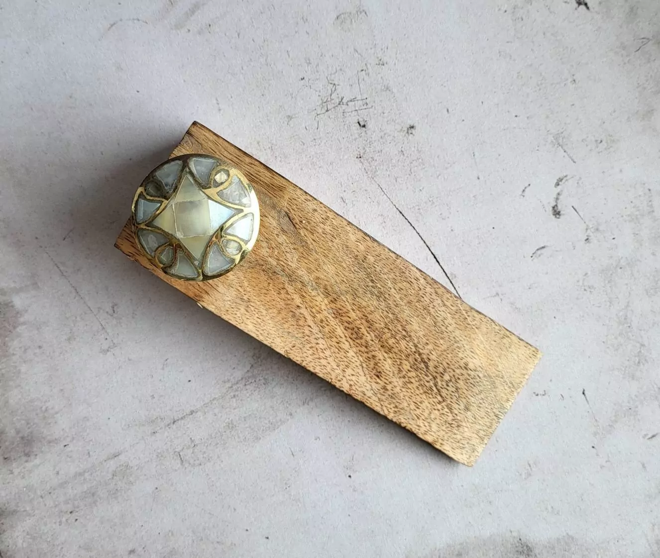 The Brass Divine Wedge