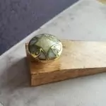 The Brass Divine Wedge
