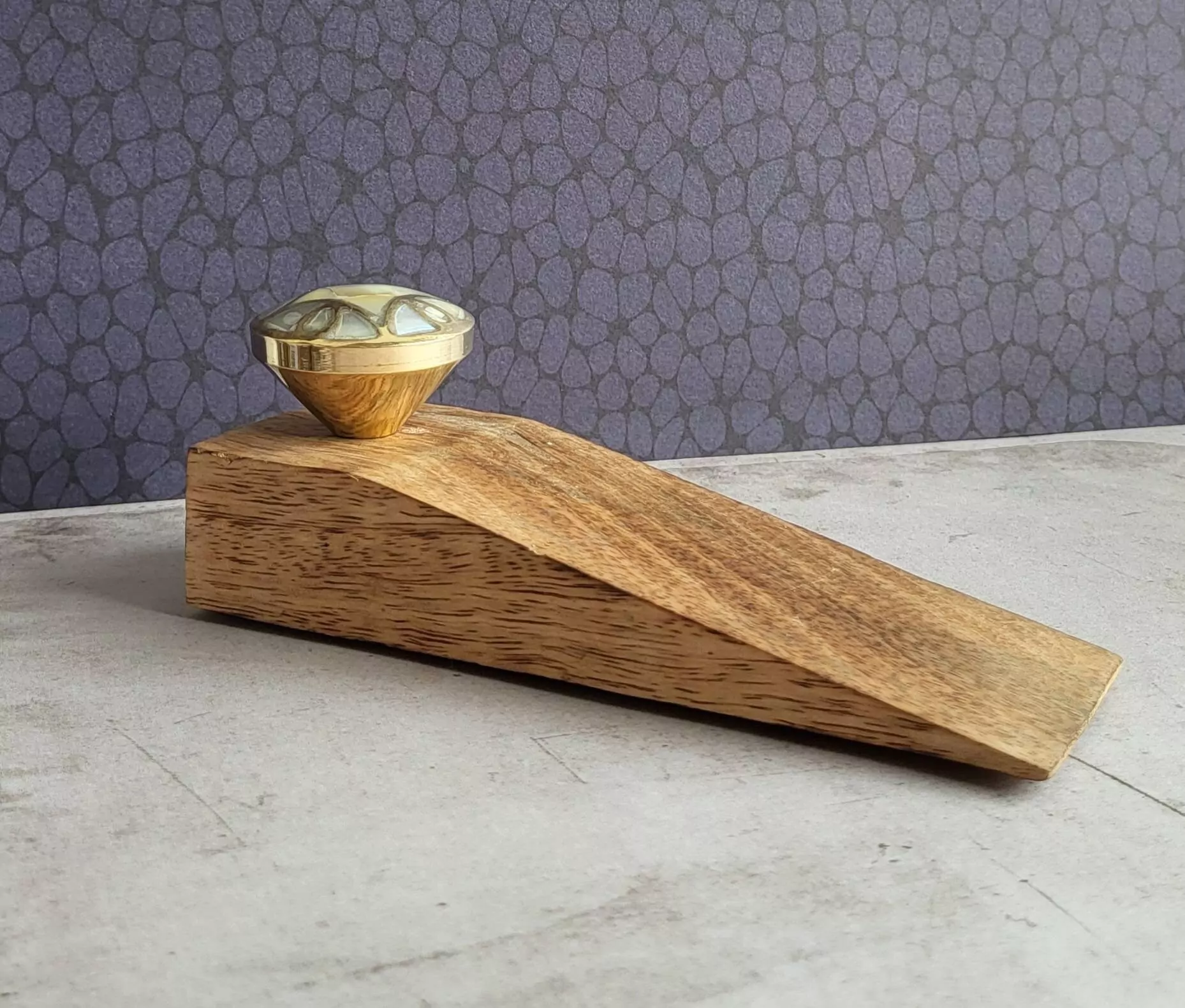 The Brass Divine Wedge