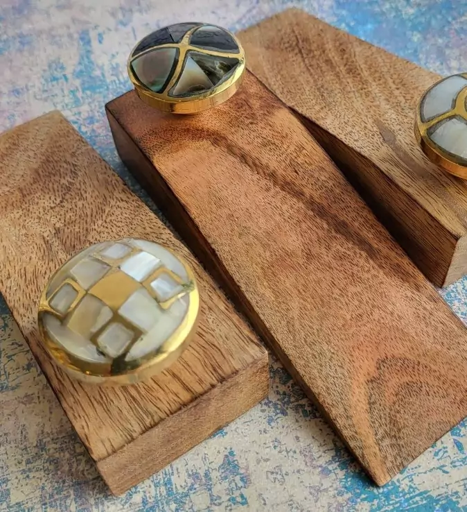 mother-of-pearl-brass-knob-door-stop