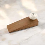 white cracked ceramic door stop