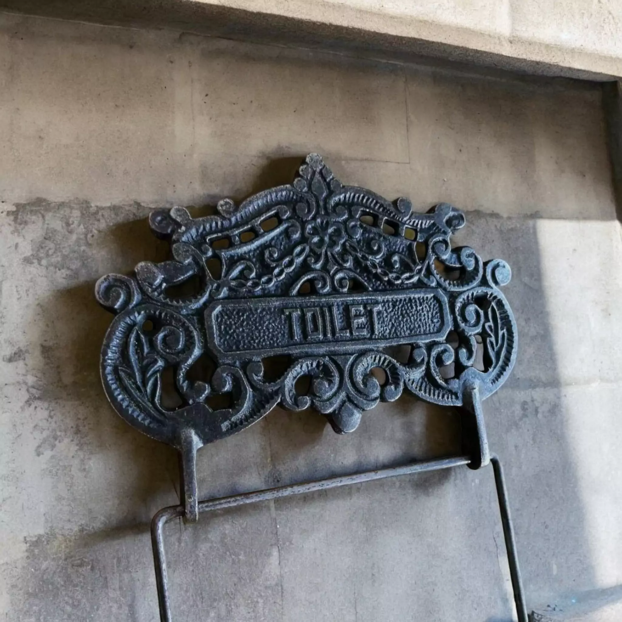 The Iron Toilet Roll Holder